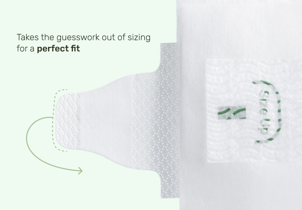 Close-up of a diaper tab and fastening panel with the text “Takes the guesswork out of sizing for a perfect fit”
