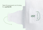Close-up of a diaper tab and fastening panel with the text “Takes the guesswork out of sizing for a perfect fit”