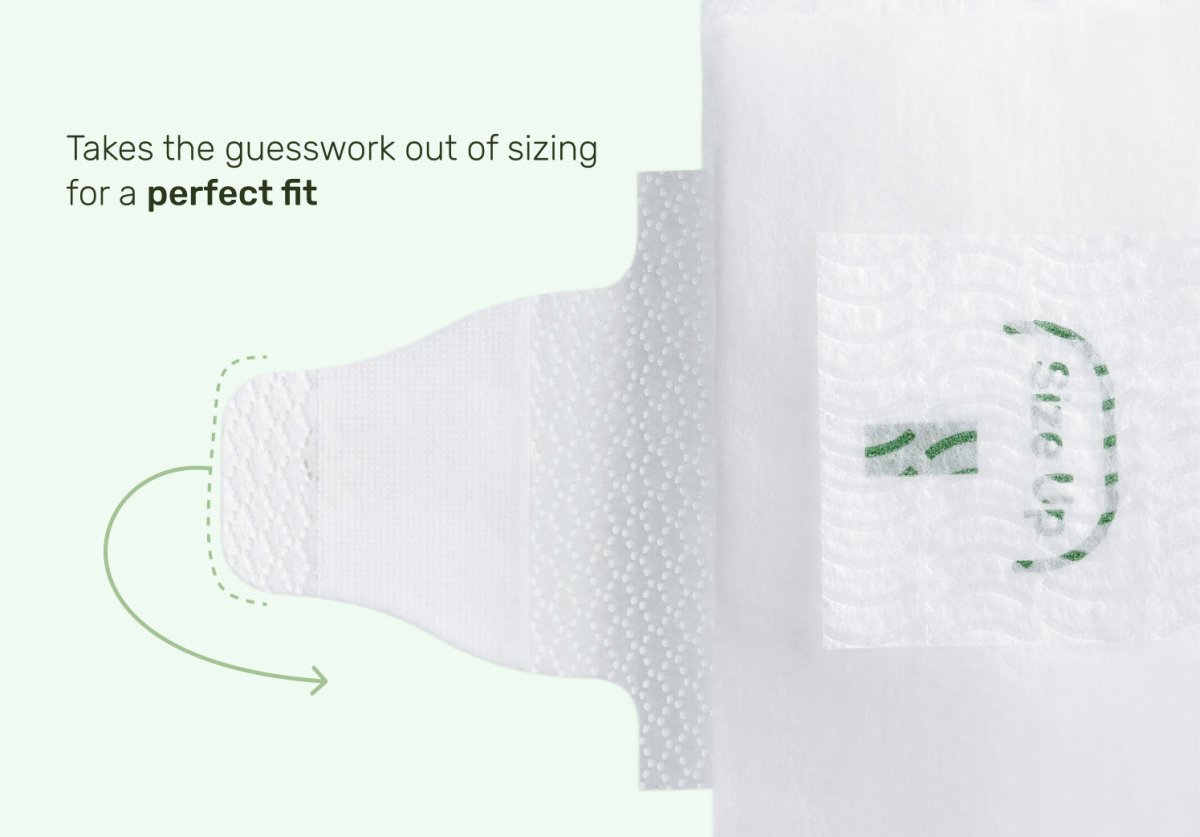 Close-up of a diaper tab and fastening panel with the text “Takes the guesswork out of sizing for a perfect fit”