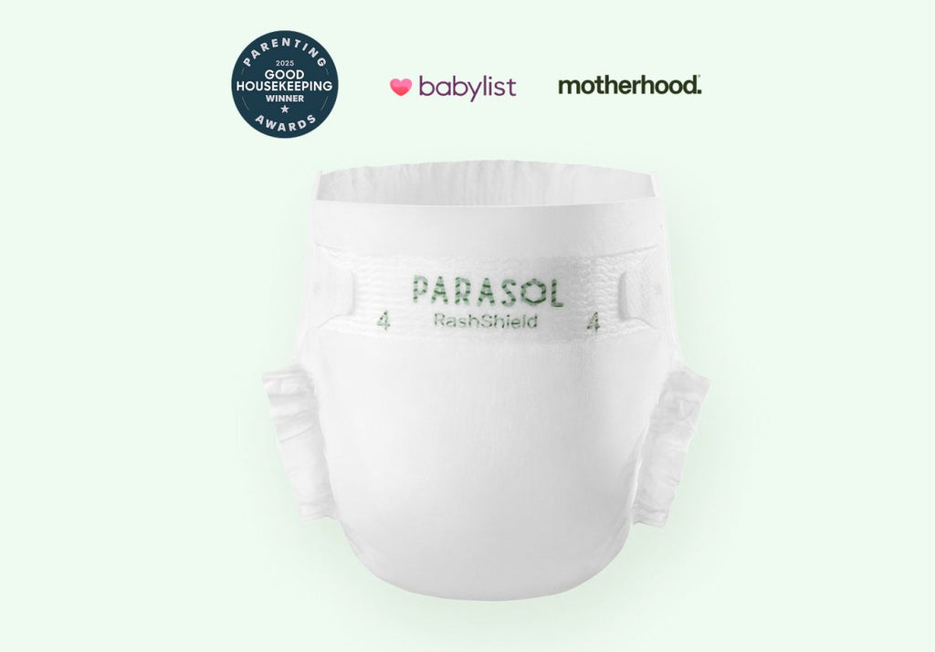 Unprinted white Parasol RashShield Size 4 diaper with Good Housekeeping Parenting Awards, Babylist and Motherhood logos