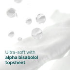 Soft white diaper topsheet fabric with water droplets and the text “Ultra-soft with alpha bisabolol topsheet”